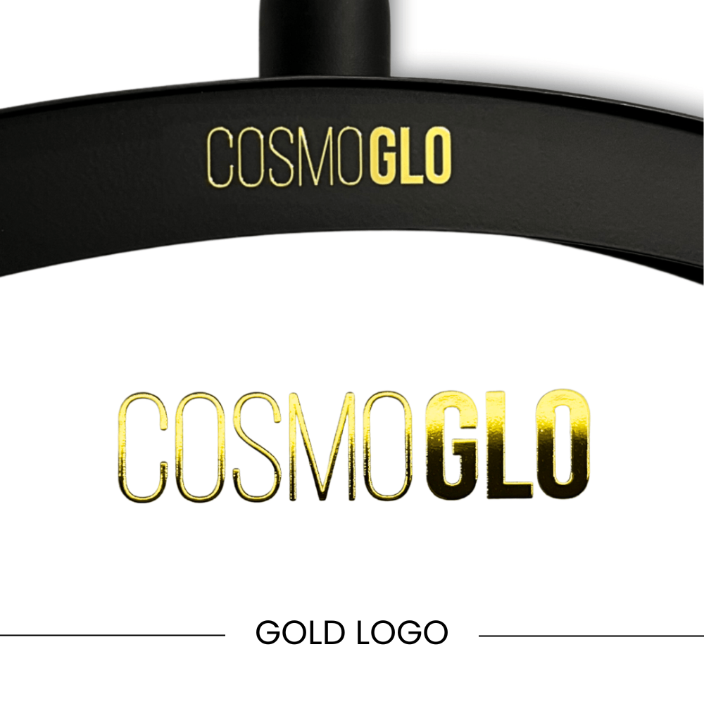 Set of four gold CosmoGlo logo decals, accessories with stylish branding, perfect for customizing or decorating items.