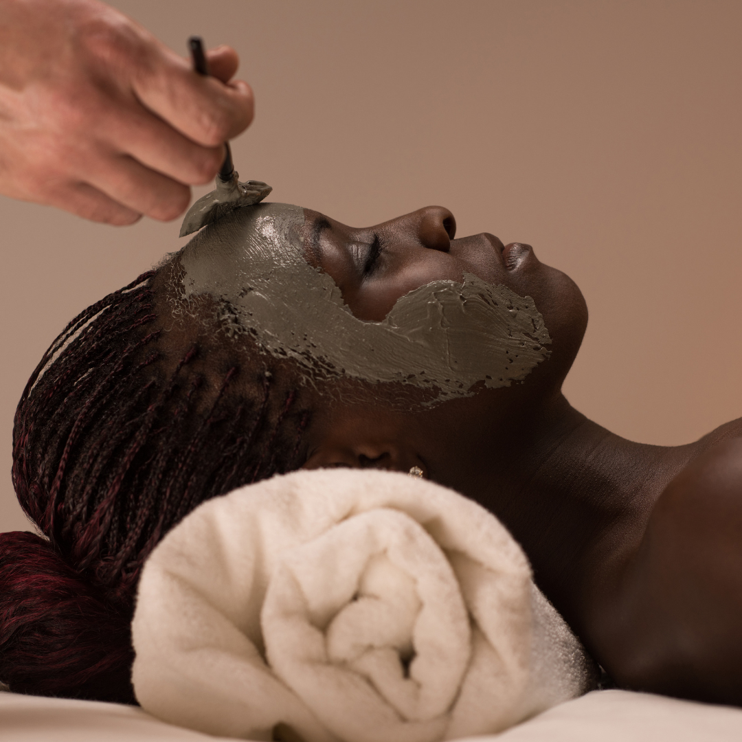 Woman receiving a facial treatment
