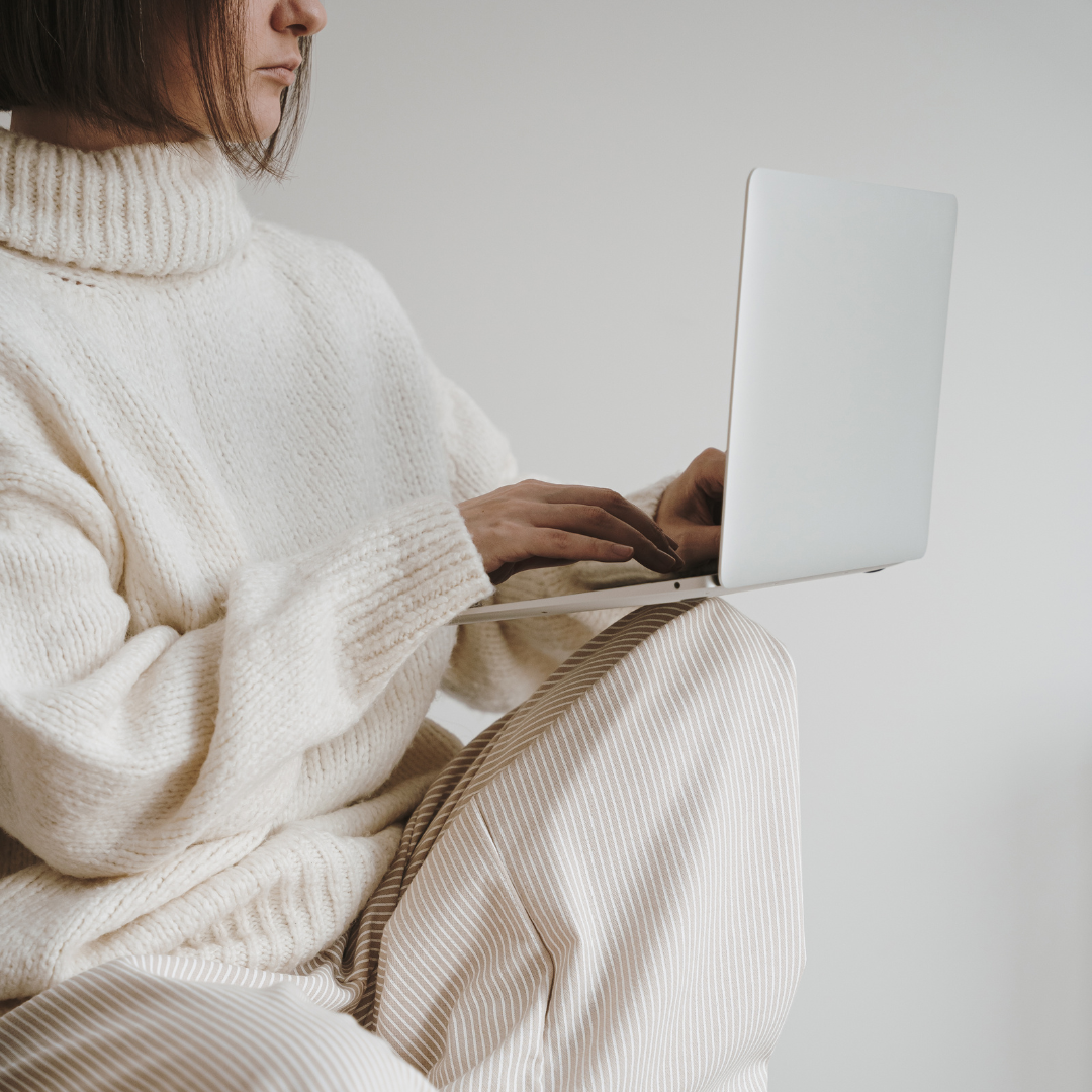 A woman working on her laptop