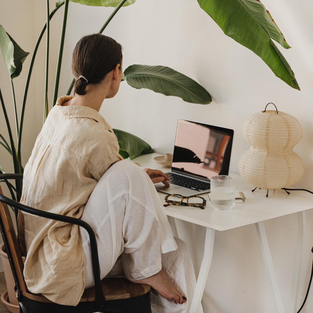 A woman working on a laptop