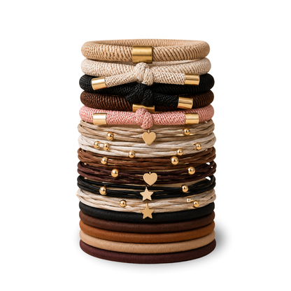 Stack of hair ties with decorative elements on a white background