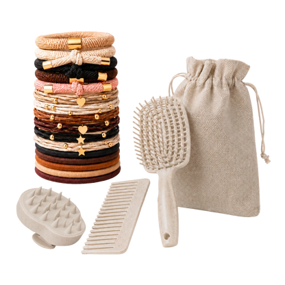 Set of hair accessories including hair ties, a brush, comb, and pouch on a white background
