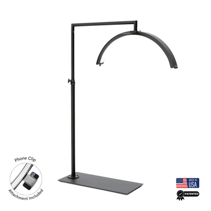 Black adjustable stand with curved arm on a white background, featuring phone clip attachment and &