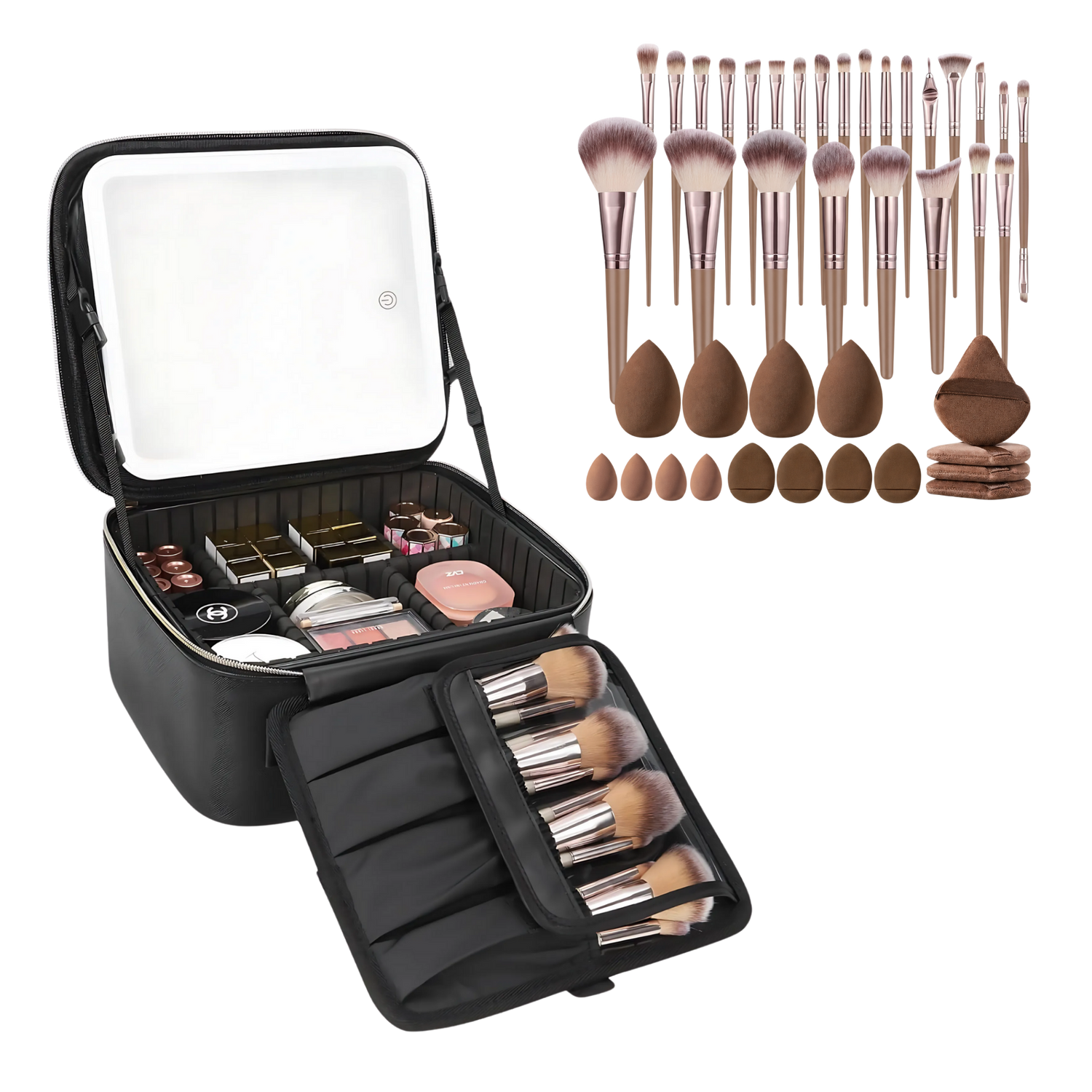 An open black makeup organizer case shown with makeup inside and a separate set of makeup brushes and sponges arranged to the right. The case has a built-in mirror on the inside lid and a roll-out brush holder.