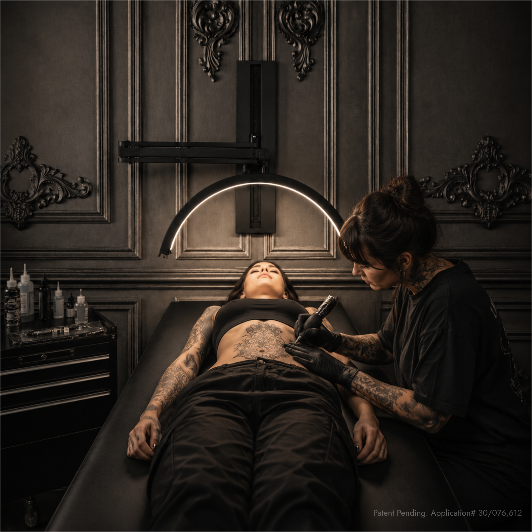 A tattoo artist wearing black gloves and a black shirt works on a client&